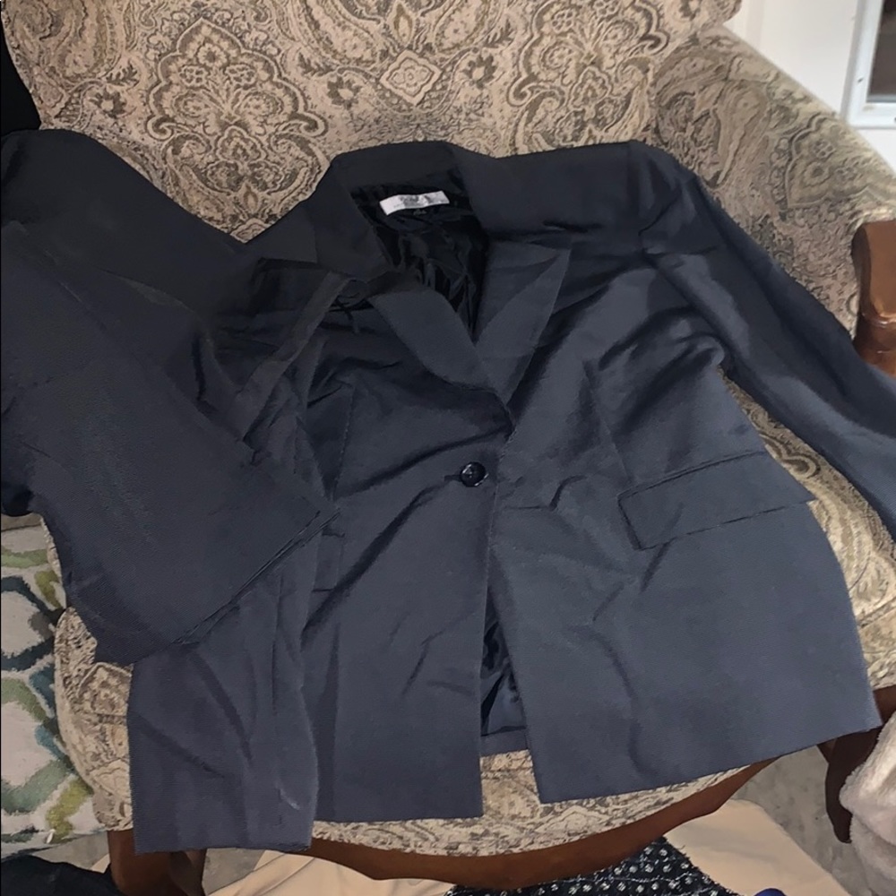 Two price pants suit . Designer: Tahari